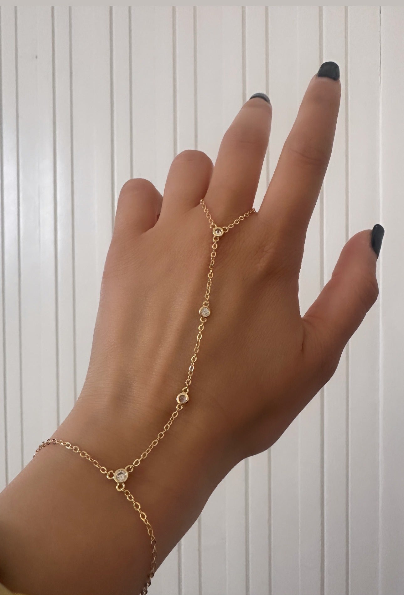 Bracelet with finger chain